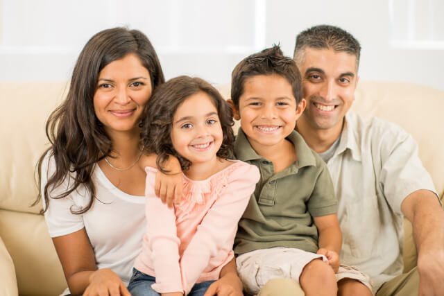 adjust-status-service immigrant mother and father with their family in indianapolis